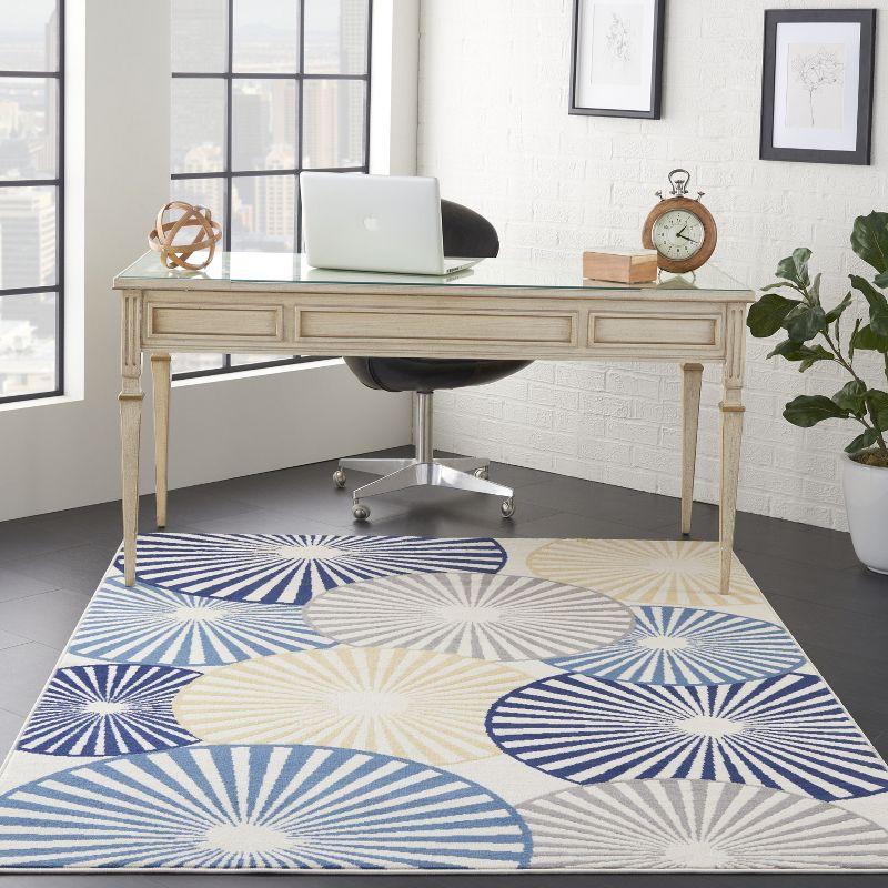 Radiant Disk Ivory and Navy 4' x 6' Synthetic Area Rug