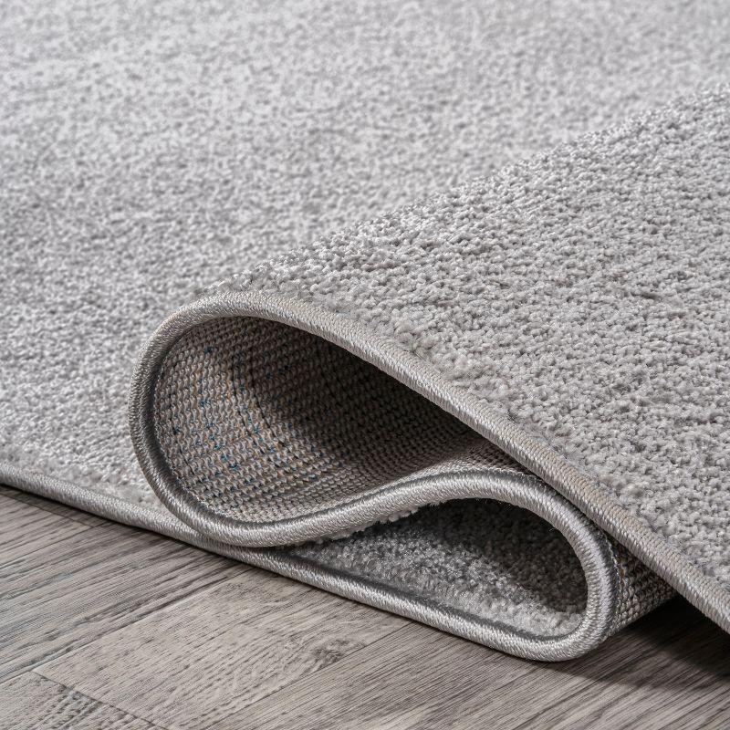 5'x8' Haze Solid Low-Pile Area Rug, Light Gray - JONATHAN Y