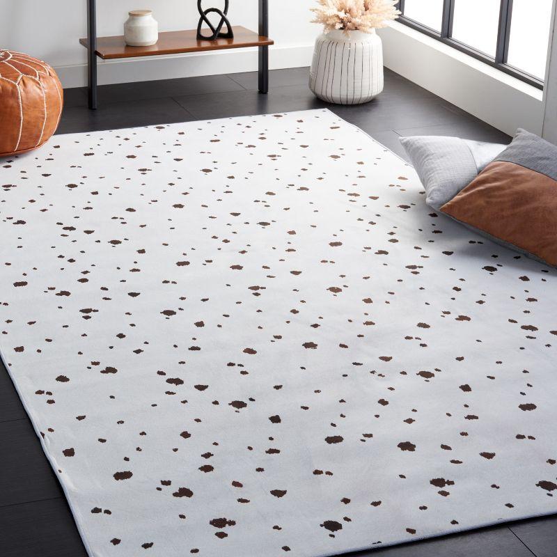 Ivory and Black Faux Hide Washable Area Rug