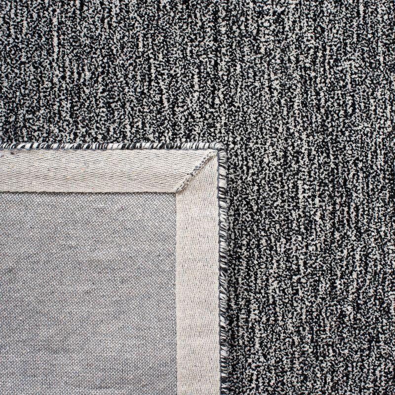 Metro MET867 Hand Tufted Indoor Area Rug - Black/Ivory - 5'x8' - Safavieh