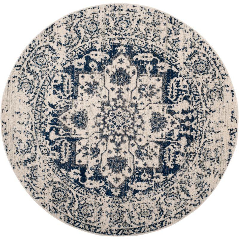 Ivory and Navy Synthetic 3' Round Reversible Area Rug