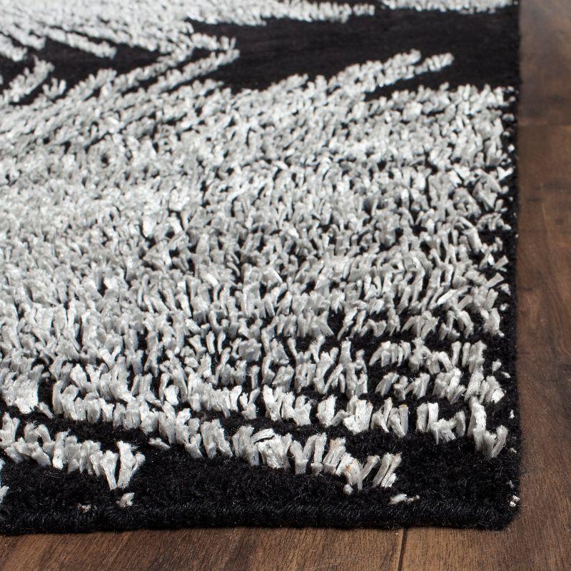 Soho SOH712 Hand Tufted Area Rug - Black/White - 7'6"x9'6" - Safavieh.