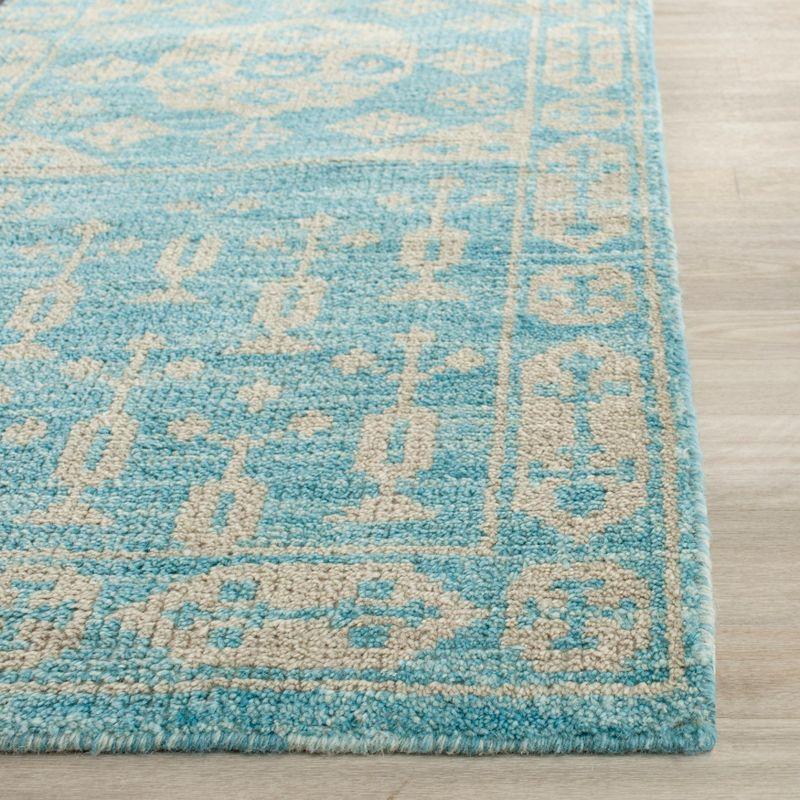 Turquoise Tribal Chic Wool 3' x 5' Hand-Knotted Rug