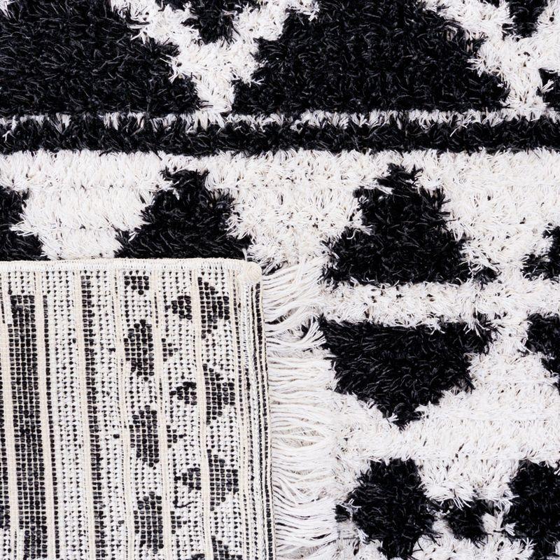 Nomadic Black/Ivory 5' x 7' Handmade Synthetic Area Rug