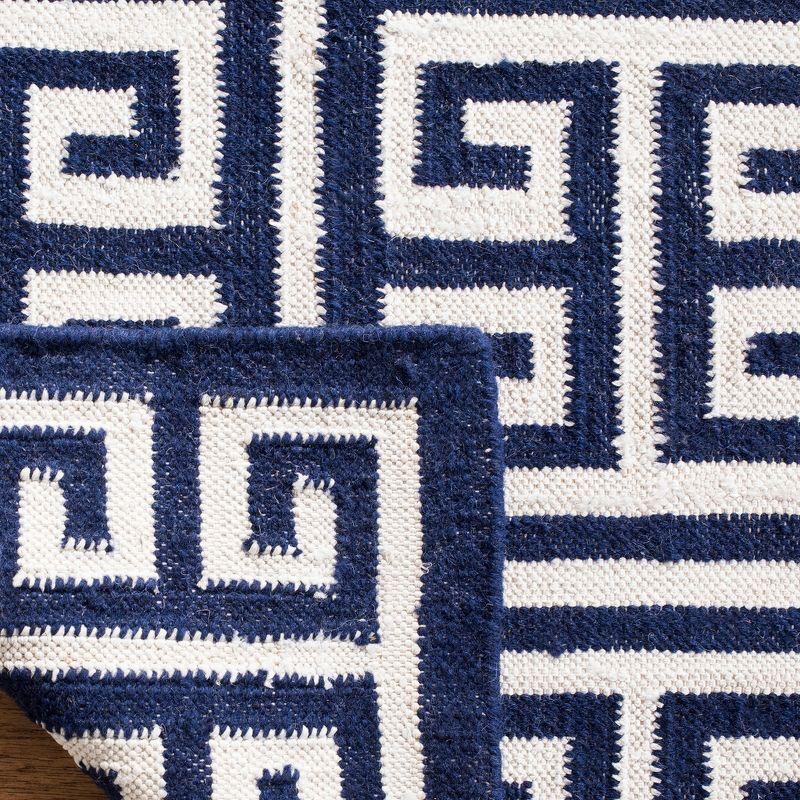 Dhurries DHU626 Hand Woven Flat Weave Accent Rug Navy / Ivory 2'-6" X 4' - Safavieh.