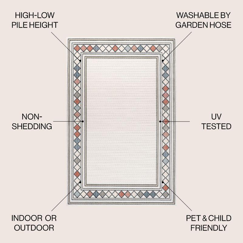 Ivory and Beige Geometric Synthetic 3' x 5' Indoor/Outdoor Rug