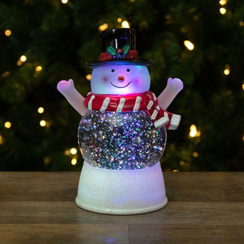 5.75" LED Lighted Snowman With Holly and Berries Top Hat Christmas Snow Globe