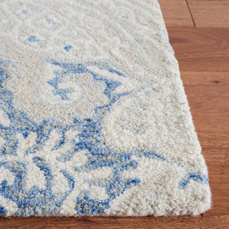 Blue and Ivory Hand-Tufted Wool Area Rug, 5' x 8'