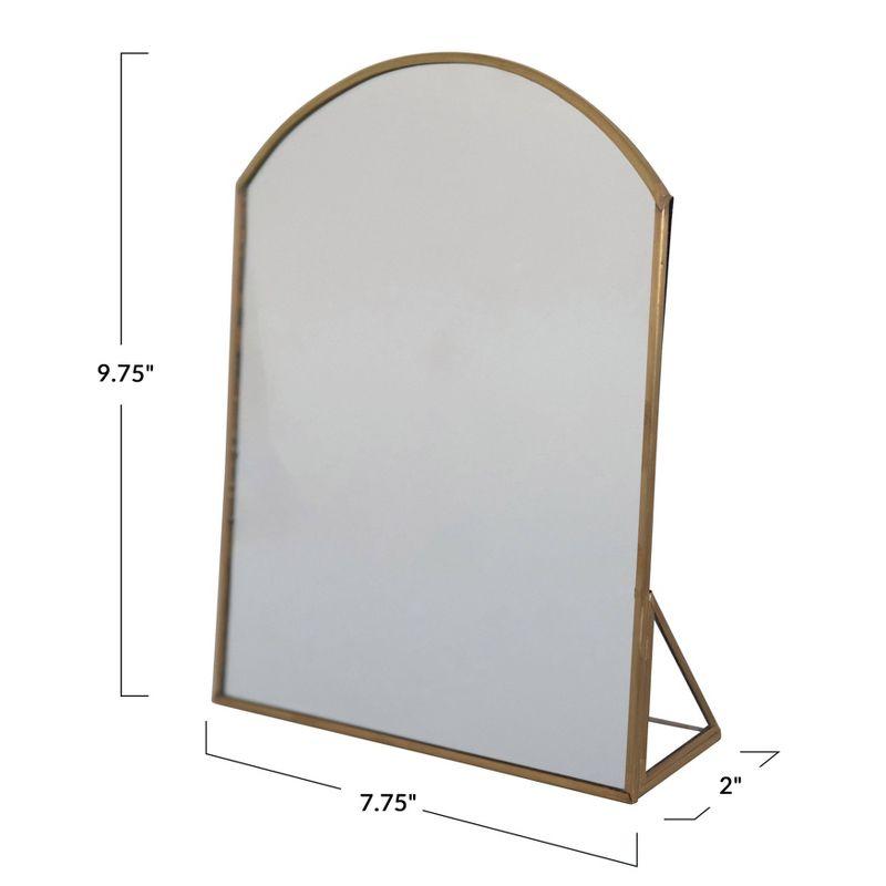 Storied Home Arched Metal Framed Standing Mirror Brass: Sleek Easel Design for Entryway or Makeup Use