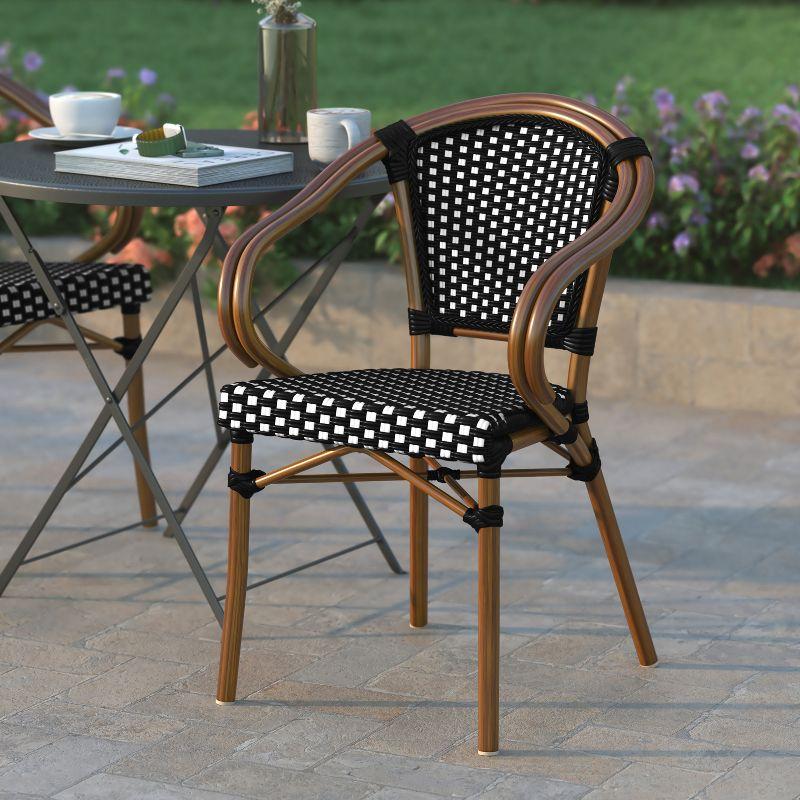 Emma & Oliver Soie Indoor/Outdoor Stacking Thonet Bistro Style Chair with Arms, Black & White PE Rattan Seat and Natural Bamboo Finished Metal Frame