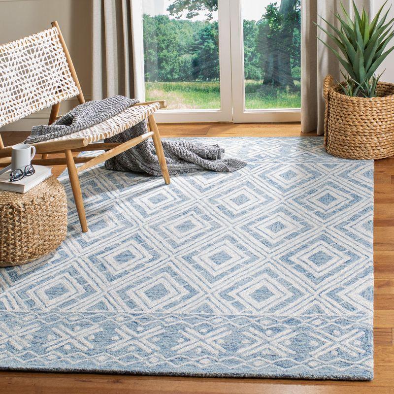 Elegant Blue Wool 4'x6' Hand-Tufted Rectangular Area Rug