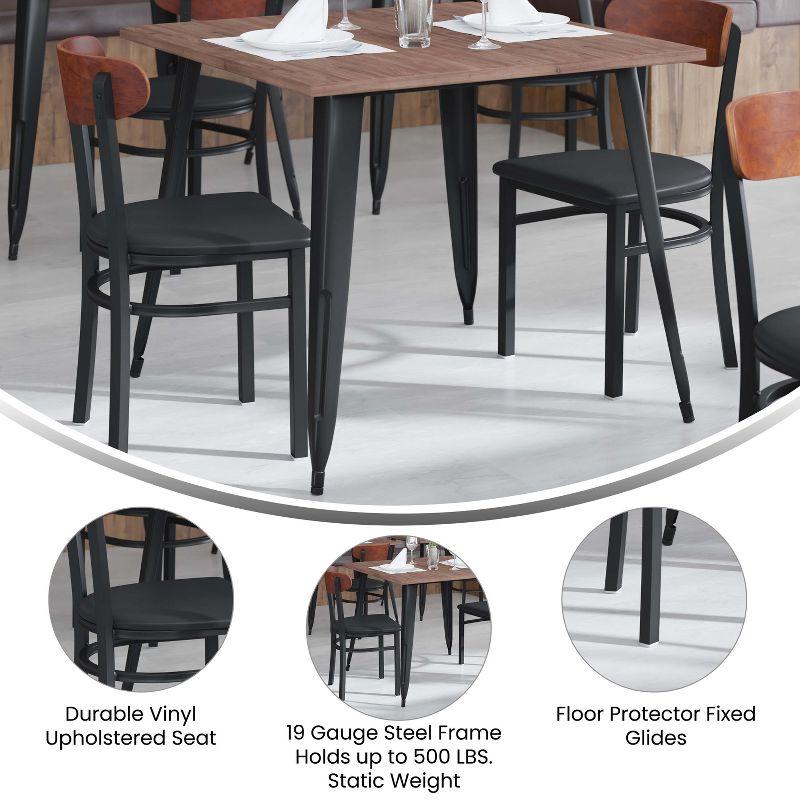 Flash Furniture Wright Commercial Dining Chair with 500 LB. Capacity Black Steel Frame, Walnut Finish Wooden Boomerang Back, and Black Vinyl Seat