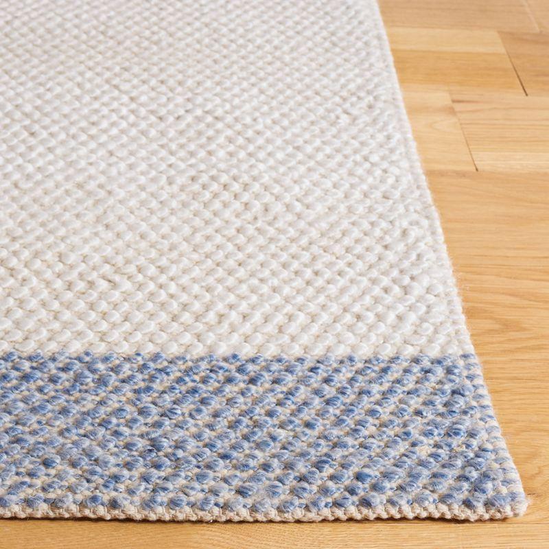 Ivory and Blue Handwoven Wool Area Rug 4' x 6'