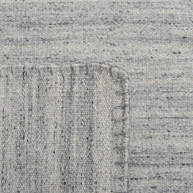 Nomadic Essence Handwoven Gray Wool 5' x 8' Area Rug