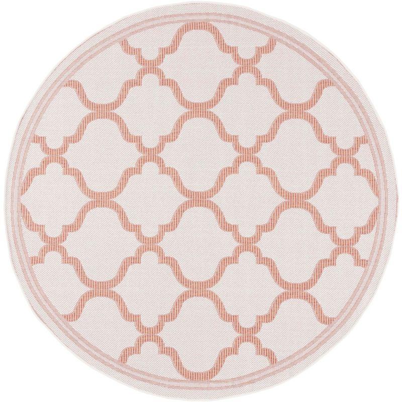 Rust and Ivory Round Synthetic Flat Woven Rug