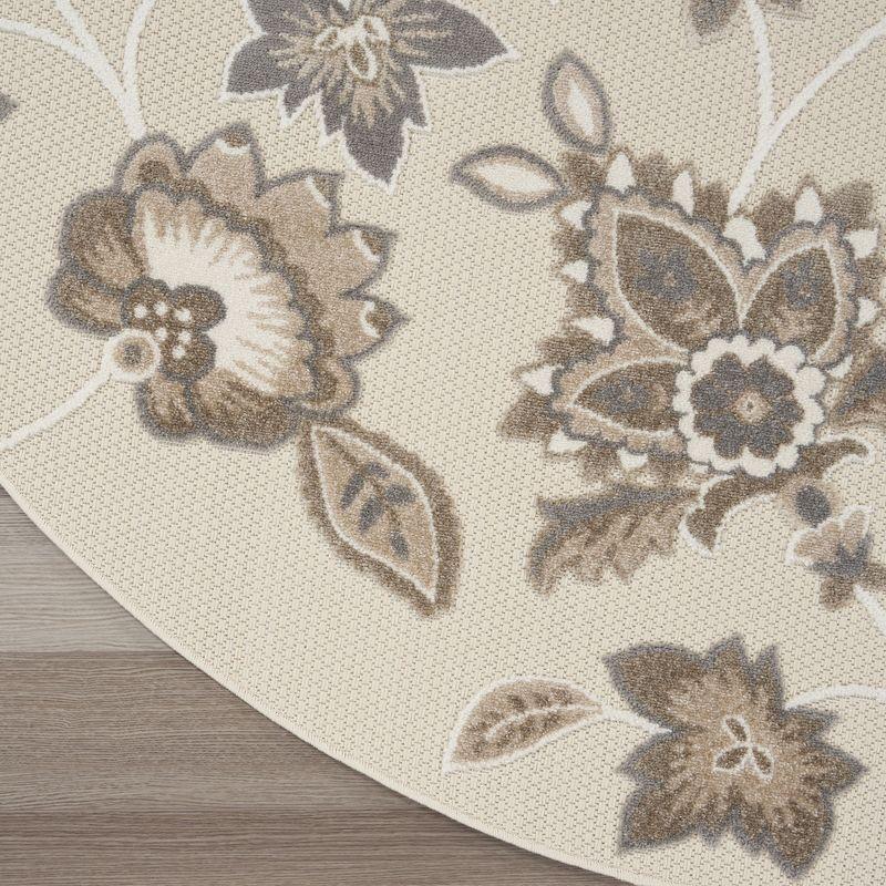 Nourison Aloha Floral Farmhouse Flatweave High-Low Indoor Outdoor Round Rug Beige 7’10” x 7'10"