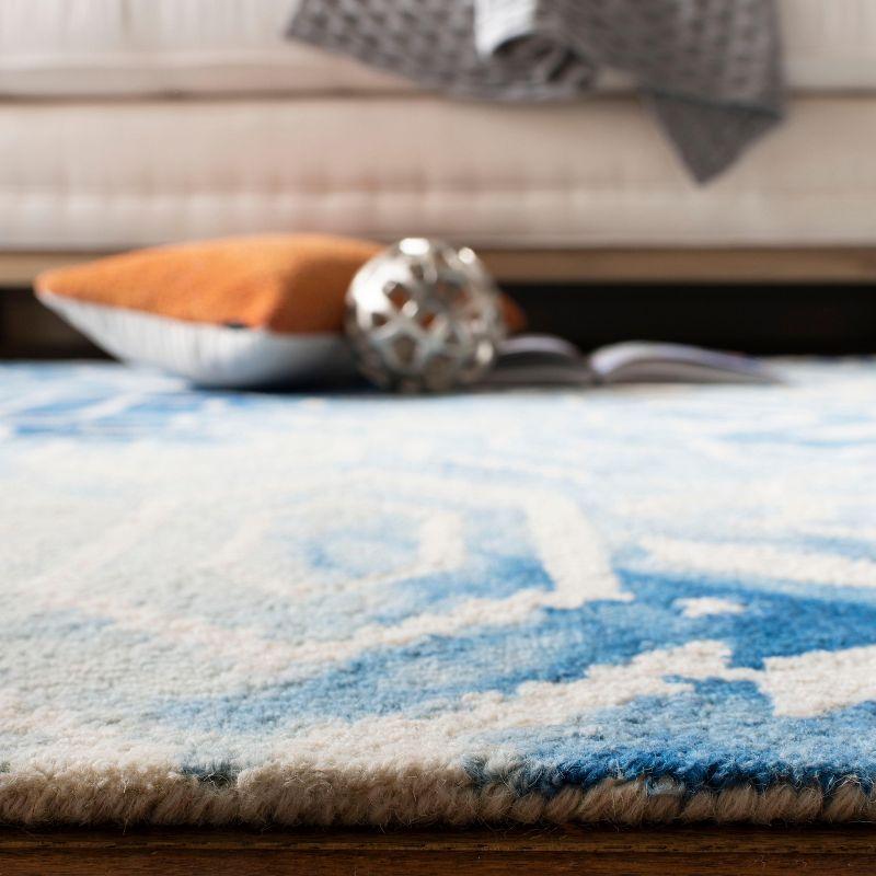Dip Dye DDY678 Hand Tufted Area Rug - Blue/Ivory - 8'x10' - Safavieh.