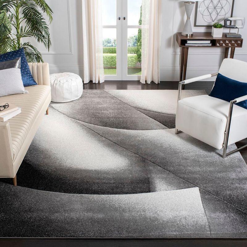 Hollywood HLW716 Power Loomed Area Rug - Grey/Dark Grey - 8'x10' - Safavieh.
