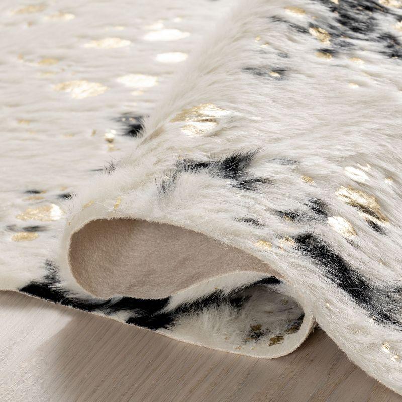 Chehalis Contemporary Faux Cowhide Power Loom Black/Gold Rug