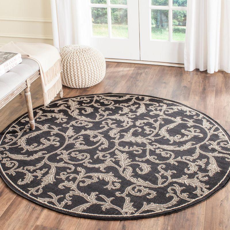 Elegant Courtyard 6'7" Round Black Synthetic Indoor/Outdoor Rug