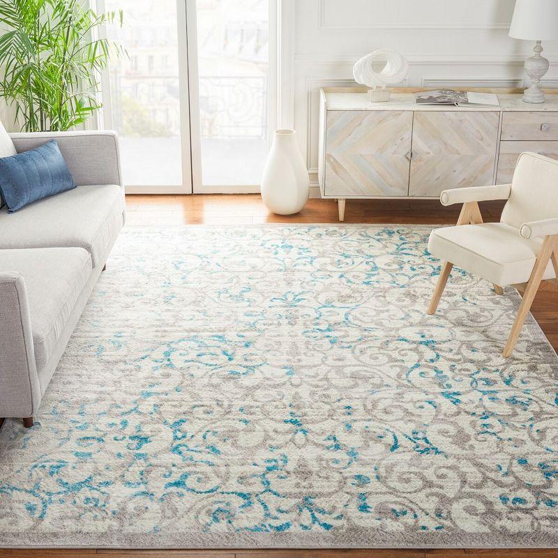 Ivory and Blue Floral 8' x 10' Synthetic Area Rug