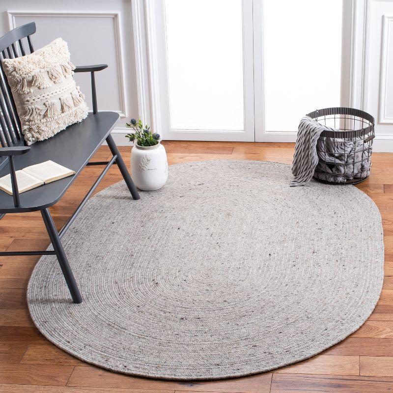 Handwoven Gray Oval Wool 8' x 10' Braided Area Rug