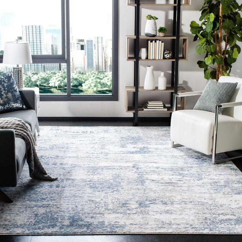 Ivory & Blue Abstract Hand-Knotted 9' x 12' Synthetic Area Rug