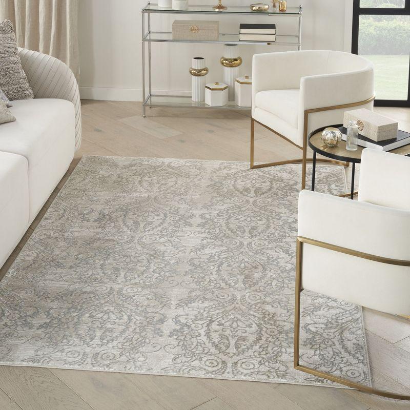 Iliana Damask Machine Woven Polyester Area Rug in Beige