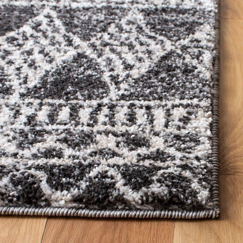 Berber-Inspired Black and Ivory Geometric Synthetic Area Rug