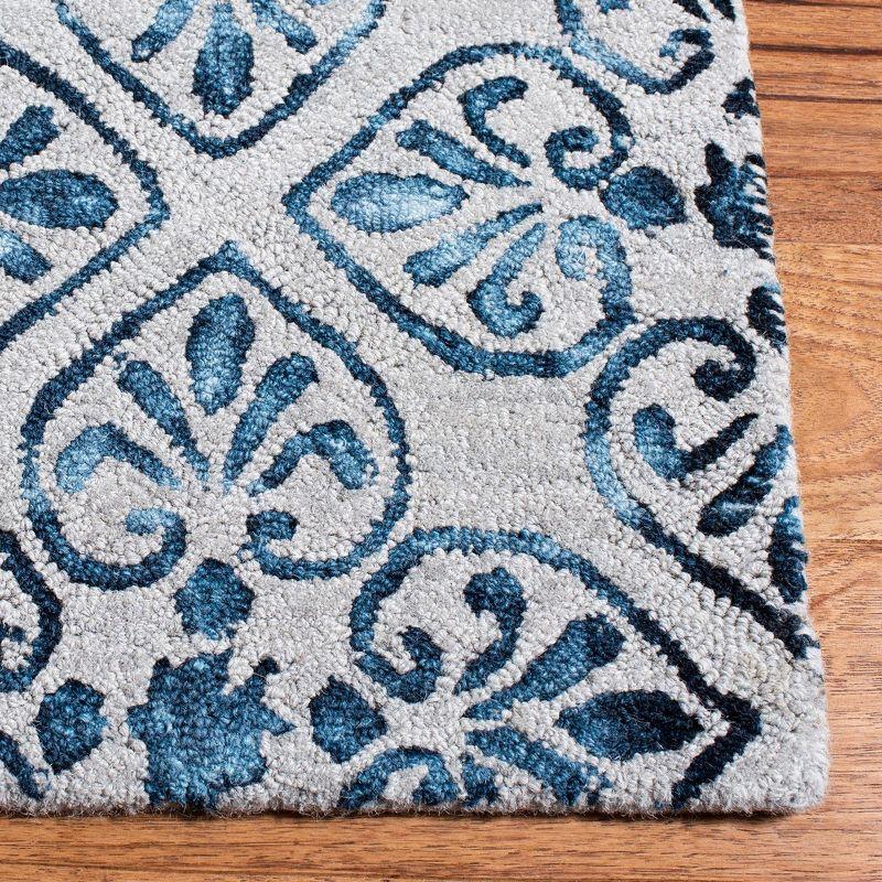 Handmade Black and Blue Wool Tufted Area Rug