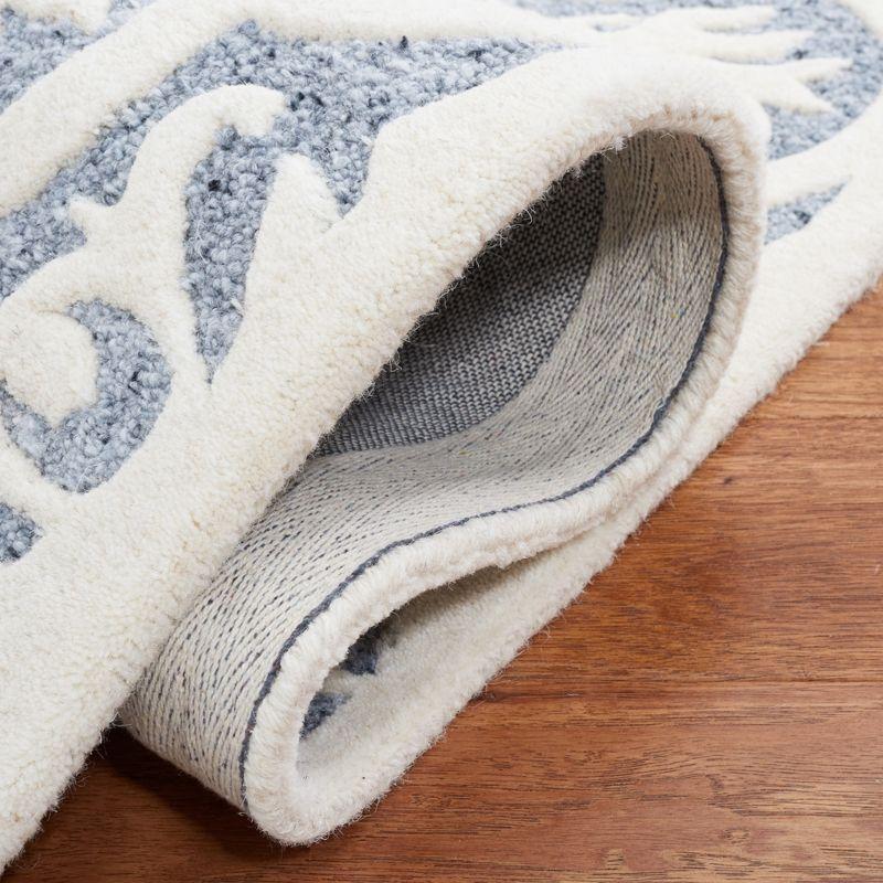 Metro MET859 Hand Tufted Indoor Area Rug - Light Blue/Ivory - 4'x6' - Safavieh