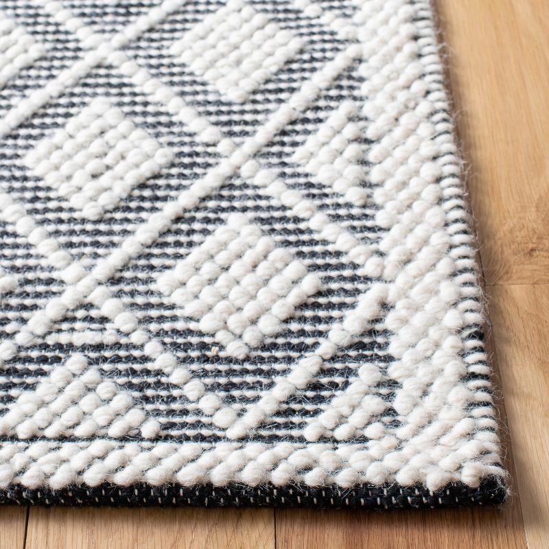 Handwoven Black and Ivory Braided Wool 6' Square Rug