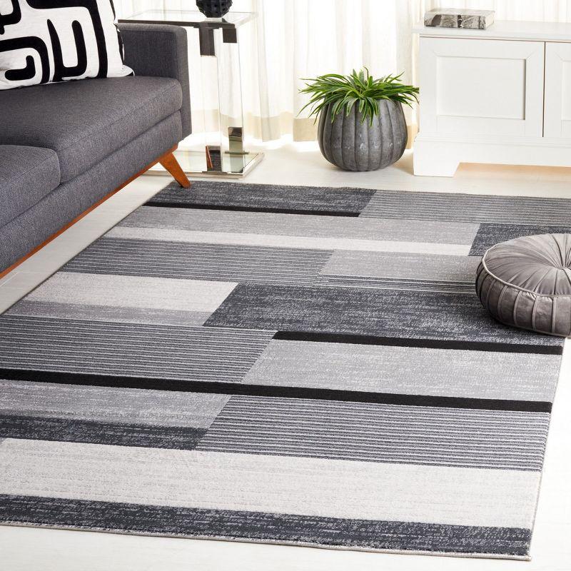 Odyssey Dark Grey and Black Synthetic Modern Area Rug