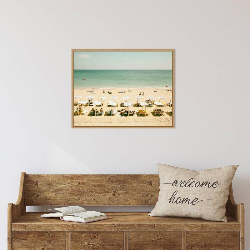 24" x 18" Seaside 3 by Carina Okula Framed Canvas Wall Art - Amanti Art: Beach Scene, Sunbathers, Coastal Decor