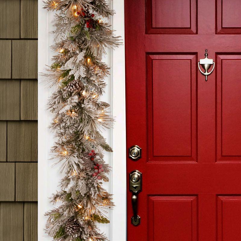 9-Foot Snowy Pine Garland with LED Lights and Pine Cones