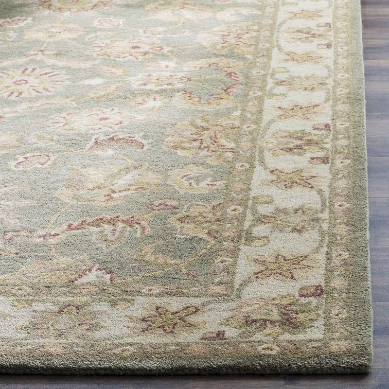 Elegant Antiquity Ivory Wool 27" x 18" Handmade Area Rug