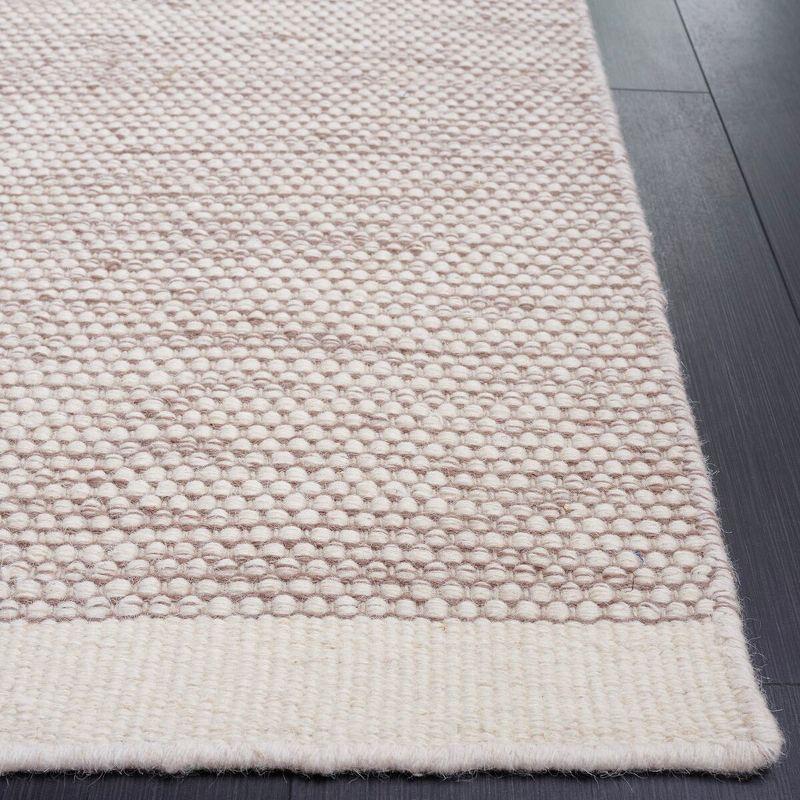 Ivory and Brown Braided Hand-Tufted Wool 6' x 9' Rug