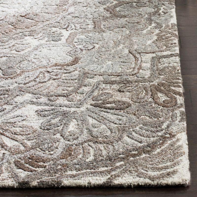 Oriental Handmade Tufted Grey /Ivory Area Rug