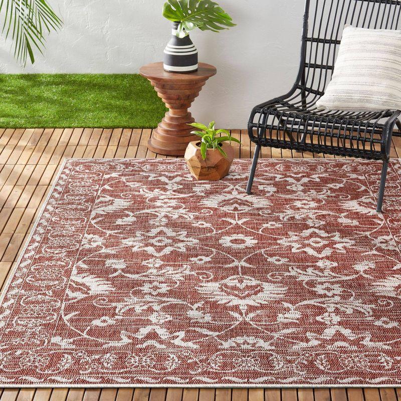 Rustic Terracotta & Ivory Floral 8' x 10' Synthetic Area Rug