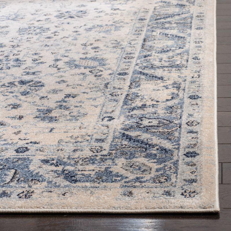 Charleston Heirloom Ivory and Blue Synthetic 6' x 9' Area Rug