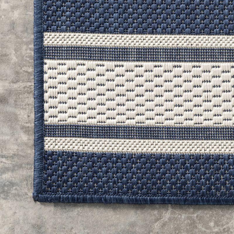 Navy Striped Synthetic 5' x 8' Easy-Care Indoor/Outdoor Rug