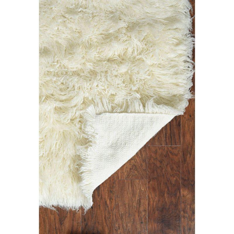 Ebern Designs Aaiden Flokati Wool Shag Hand Loomed Ivory Rug