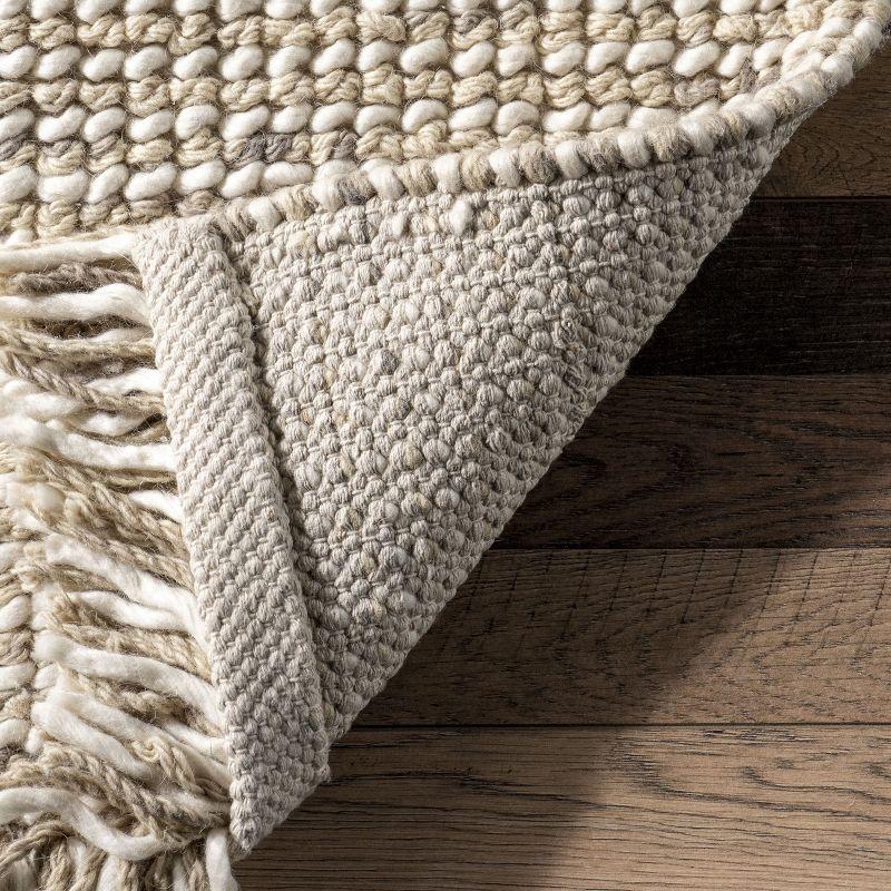 Handwoven Ivory Wool 7'6" x 9'6" Easy-Care Area Rug