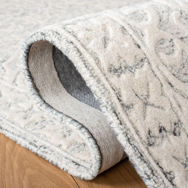 Metro MET857 Hand Tufted Indoor Area Rug - Silver/Ivory - 5'x8' - Safavieh