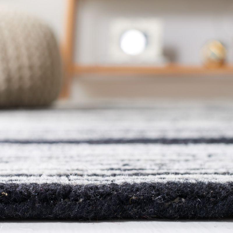 Metro MET995 Hand Tufted Indoor Area Rug - Ivory/Black - 8'x10' - Safavieh