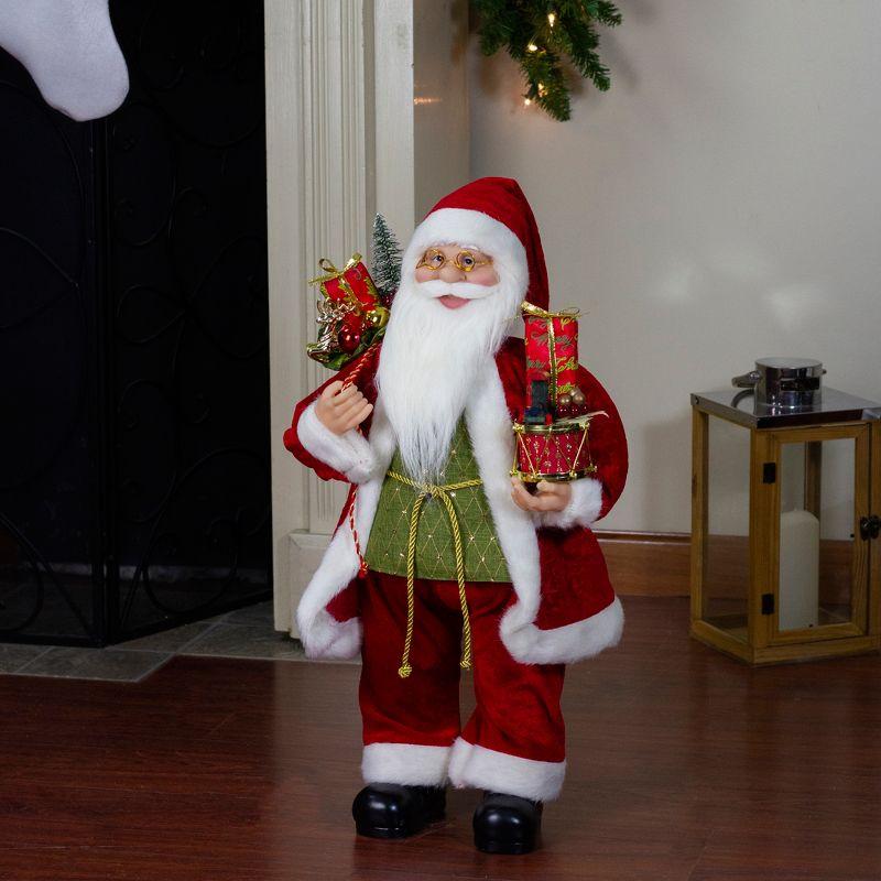 24" Red and White Santa Claus with Presents and Drum Christmas Figure