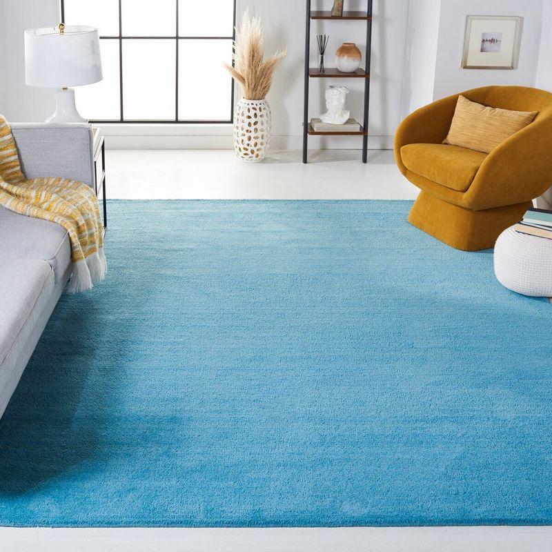 Moreau Handmade Tufted Wool Turquoise Area Rug