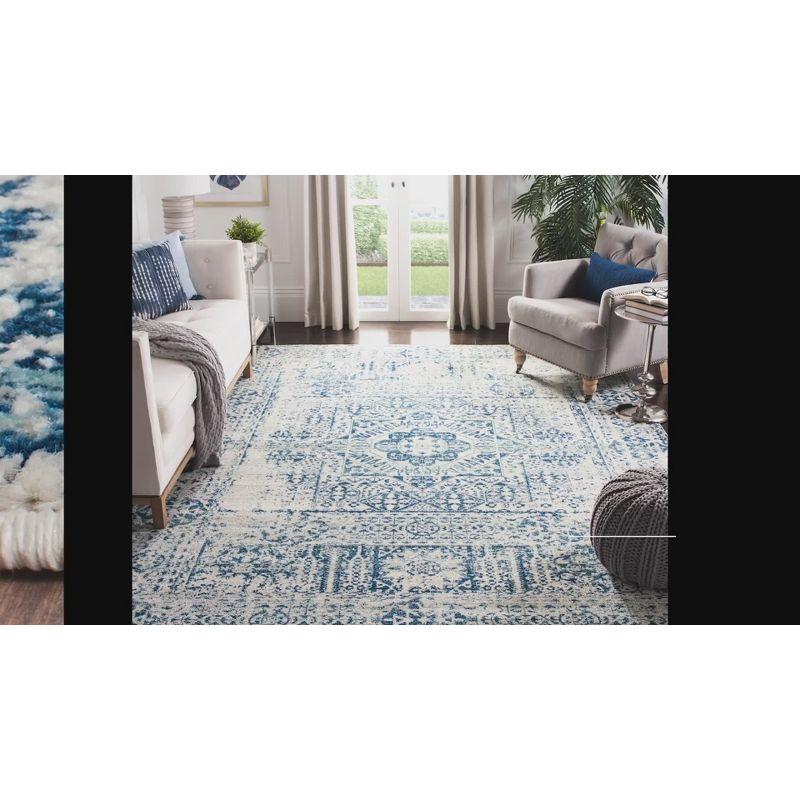 Ivory and Blue High Pile Synthetic Area Rug