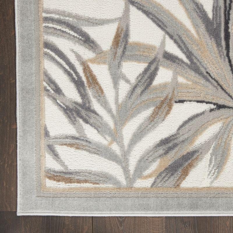 Ivory Elegance 8' x 10' Synthetic Tropical Botanical Area Rug