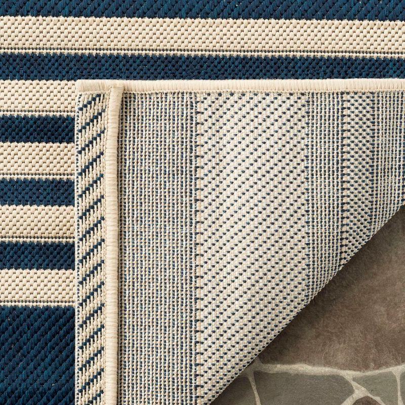 Navy and Beige Striped Synthetic Indoor/Outdoor Area Rug, 5' x 7'